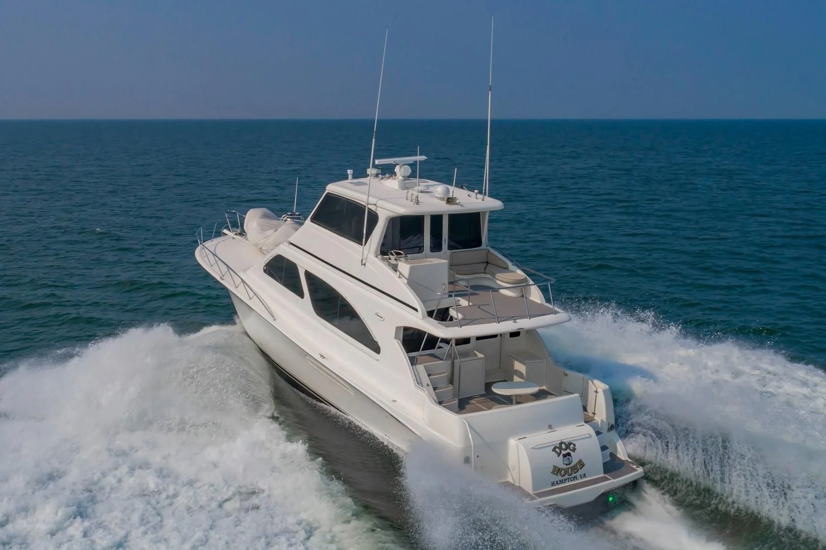 a boat on the water aboard DOG HOUSE Yacht for Sale