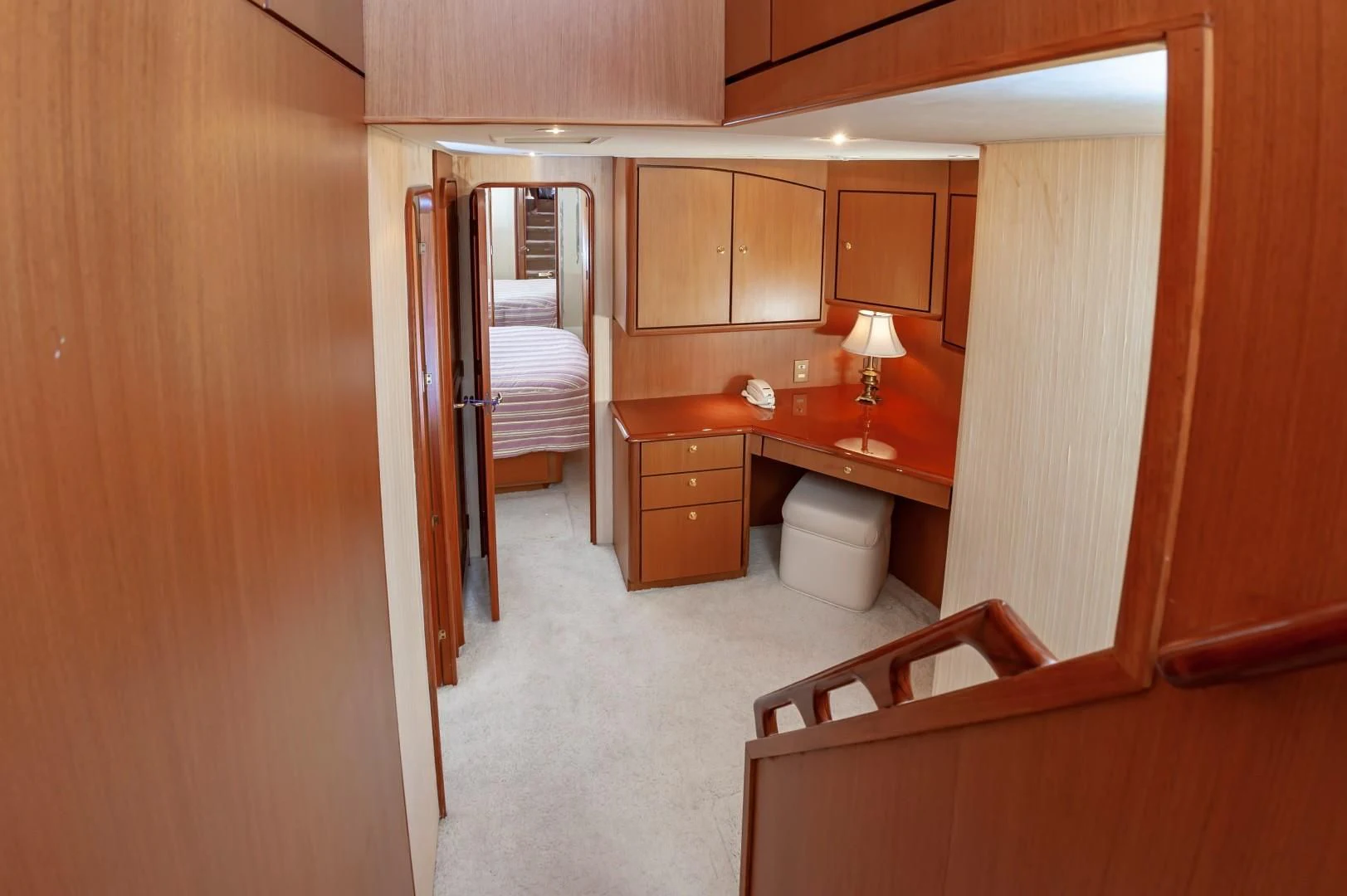 a room with a bed and a desk aboard DOG HOUSE Yacht for Sale