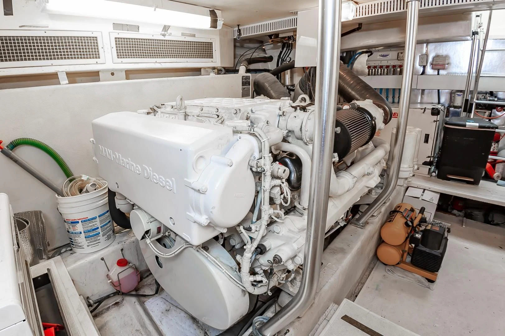 a large white machine aboard DOG HOUSE Yacht for Sale