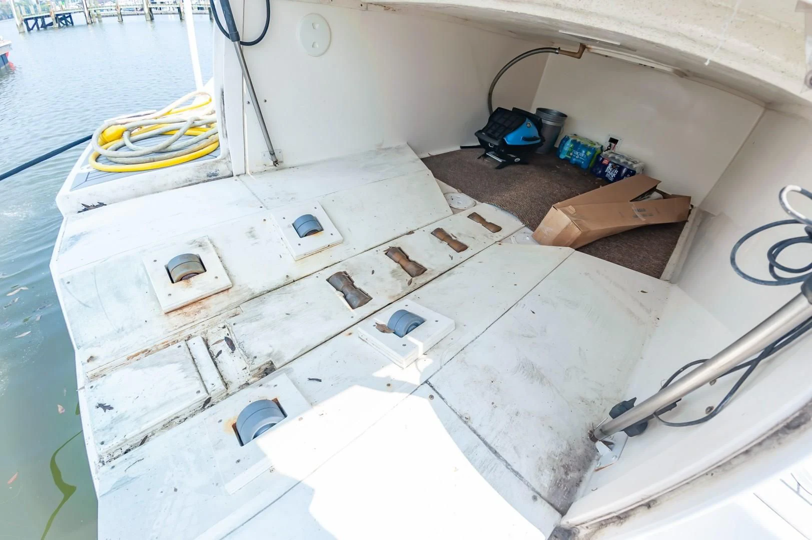 a white rectangular object with a black object on it aboard DOG HOUSE Yacht for Sale