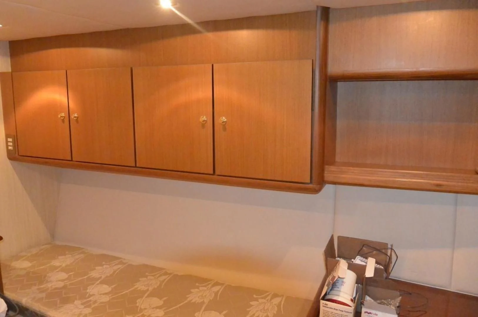 a room with wooden cabinets aboard DOG HOUSE Yacht for Sale