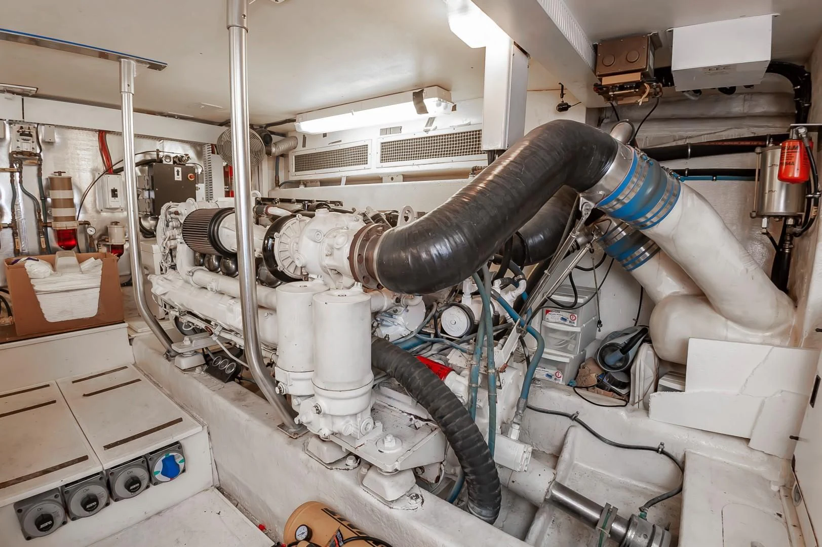 a machine with a large pipe aboard DOG HOUSE Yacht for Sale