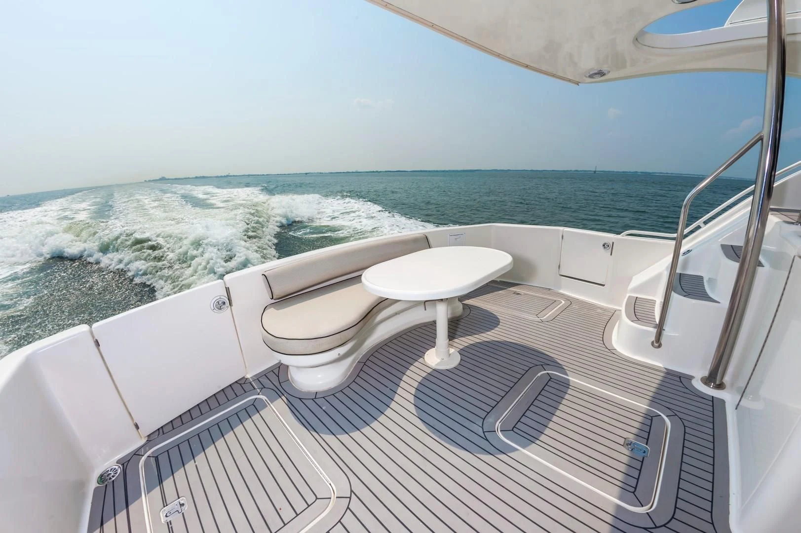 a bathroom with a tub and a sink aboard DOG HOUSE Yacht for Sale