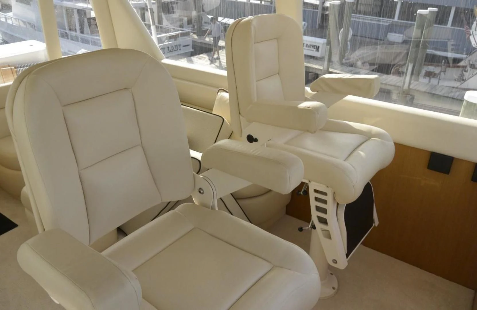 a white chair in a room aboard DOG HOUSE Yacht for Sale