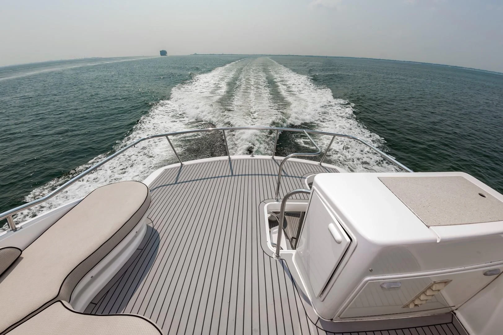 a boat on the water aboard DOG HOUSE Yacht for Sale
