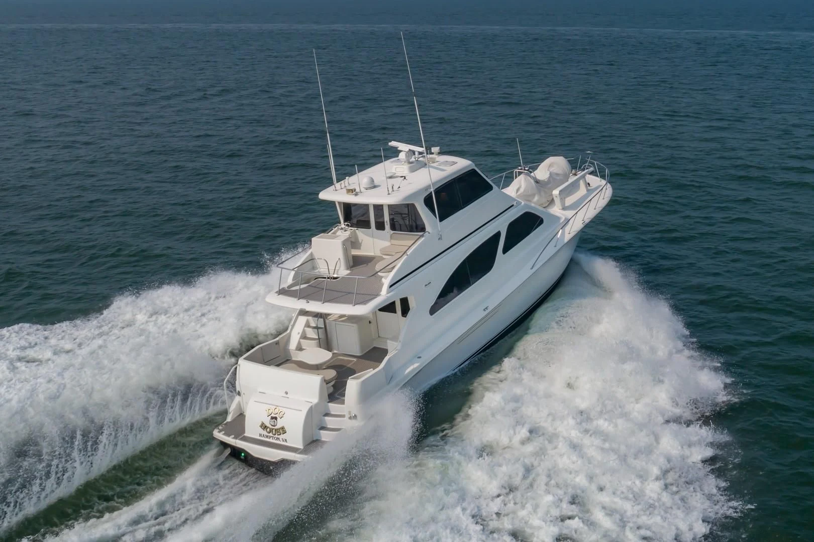 a boat on the water aboard DOG HOUSE Yacht for Sale