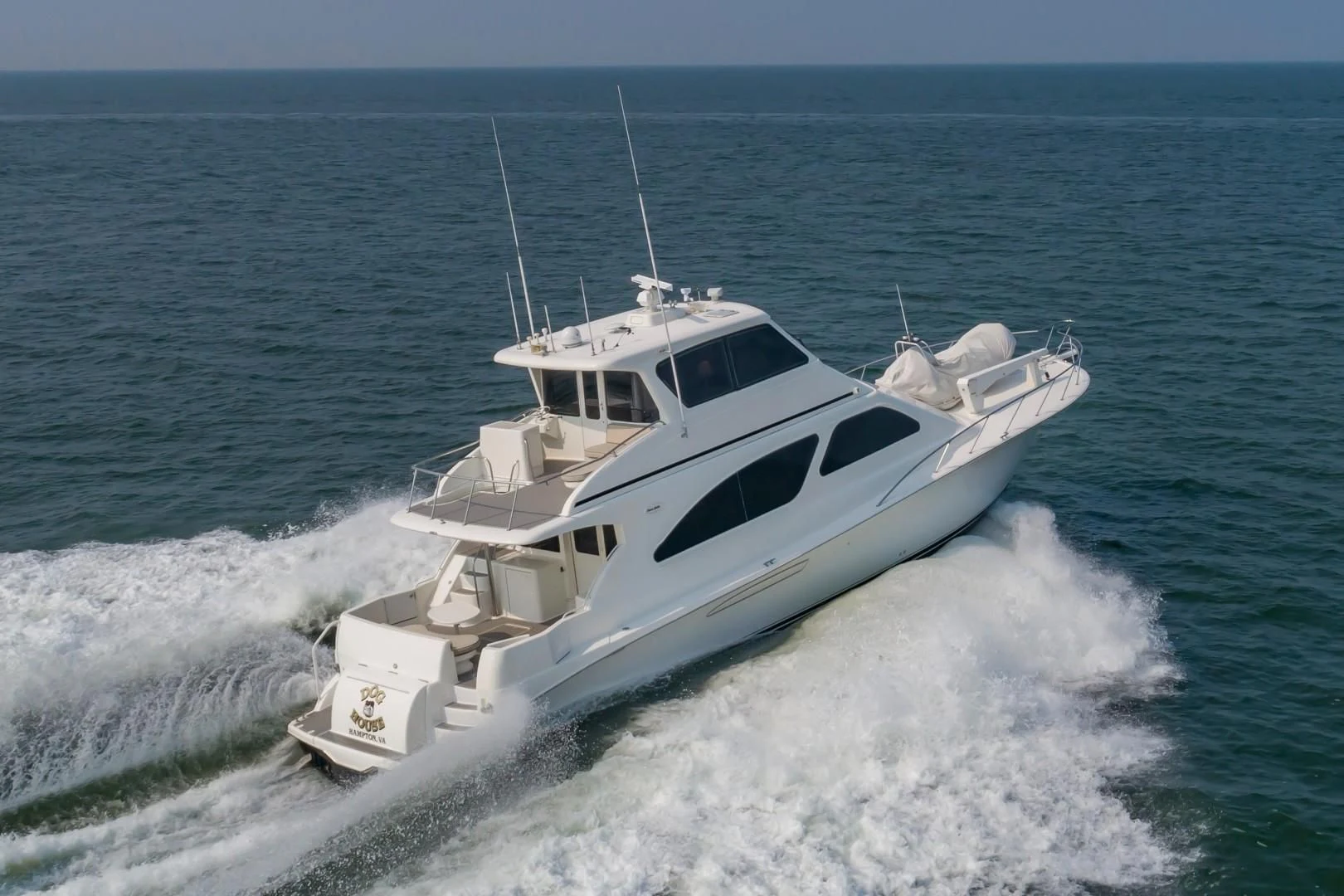a boat on the water aboard DOG HOUSE Yacht for Sale