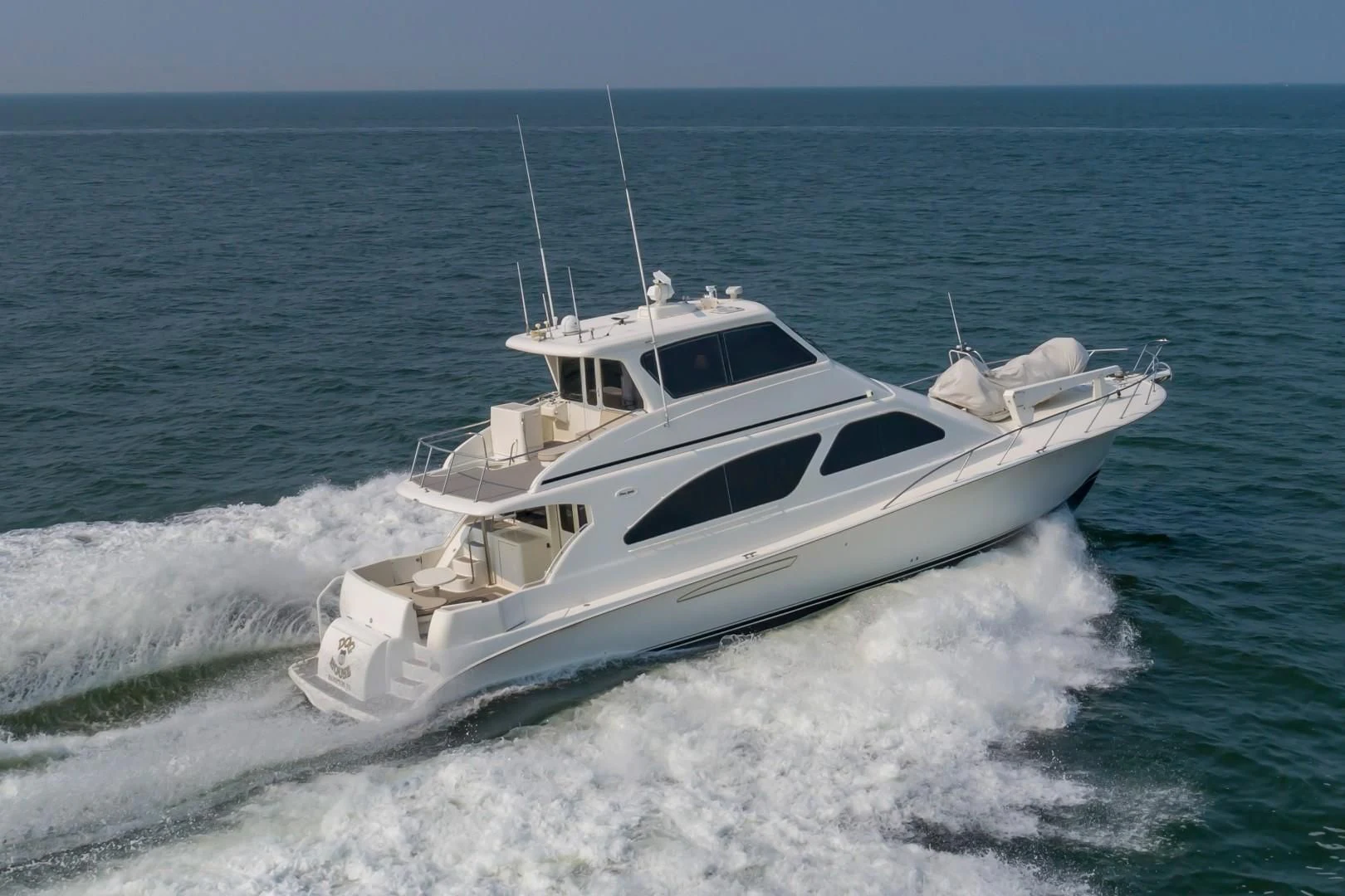 a boat on the water aboard DOG HOUSE Yacht for Sale