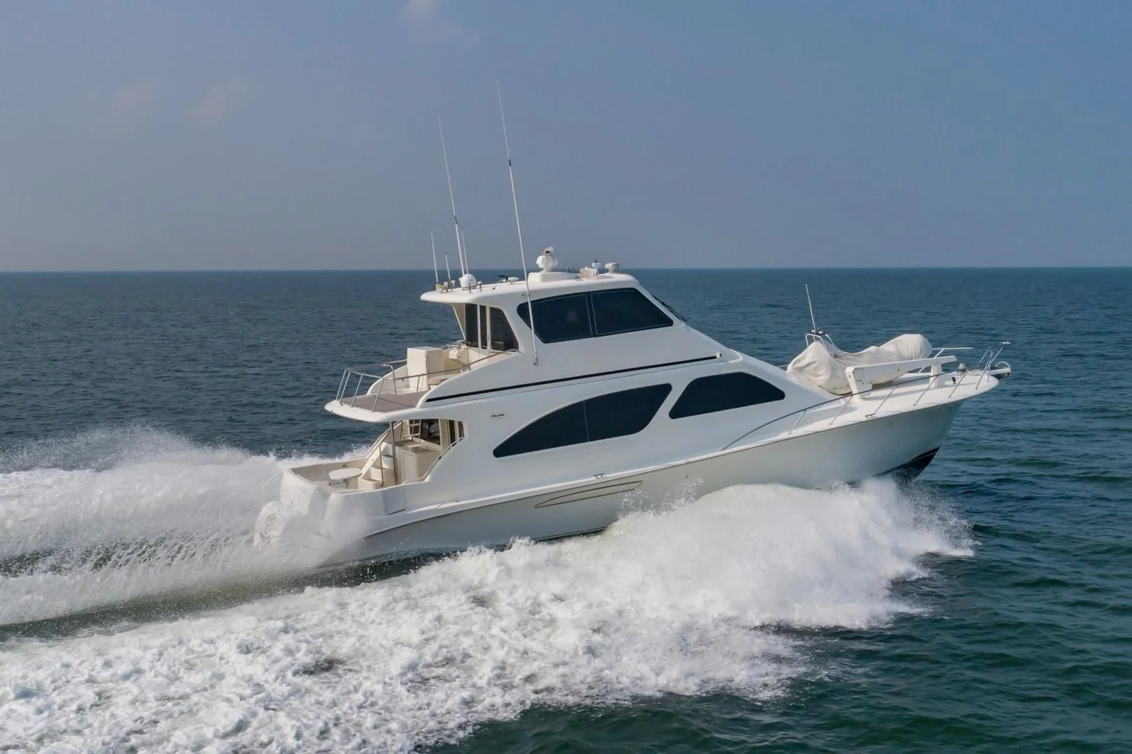 a boat on the water aboard DOG HOUSE Yacht for Sale