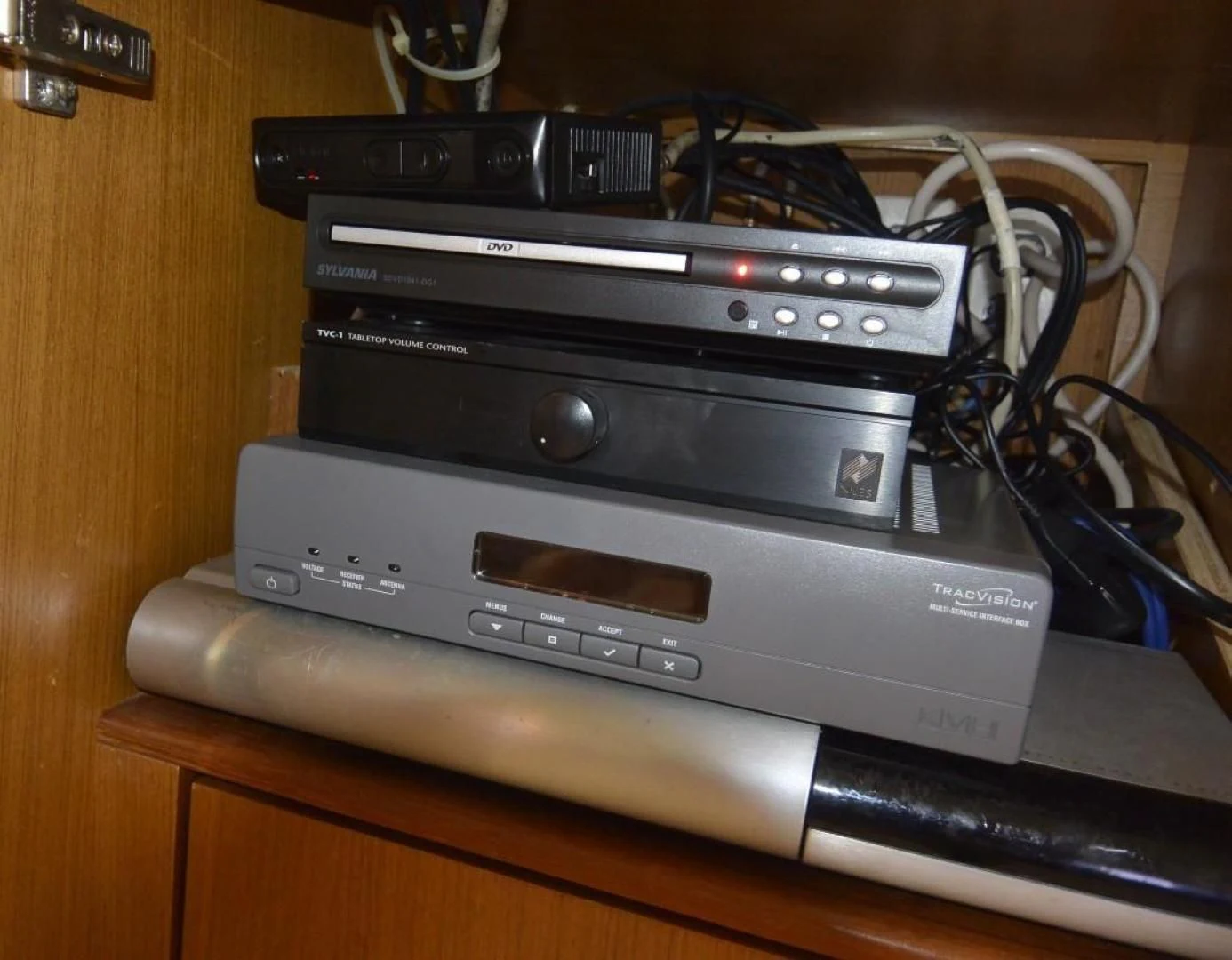 a video game console on a wooden surface aboard DOG HOUSE Yacht for Sale