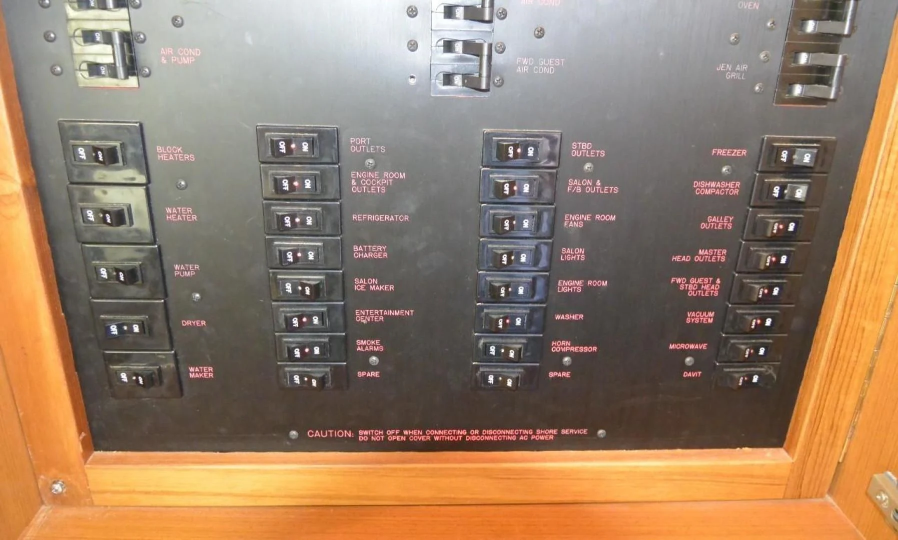 a black computer with a red and white display aboard DOG HOUSE Yacht for Sale