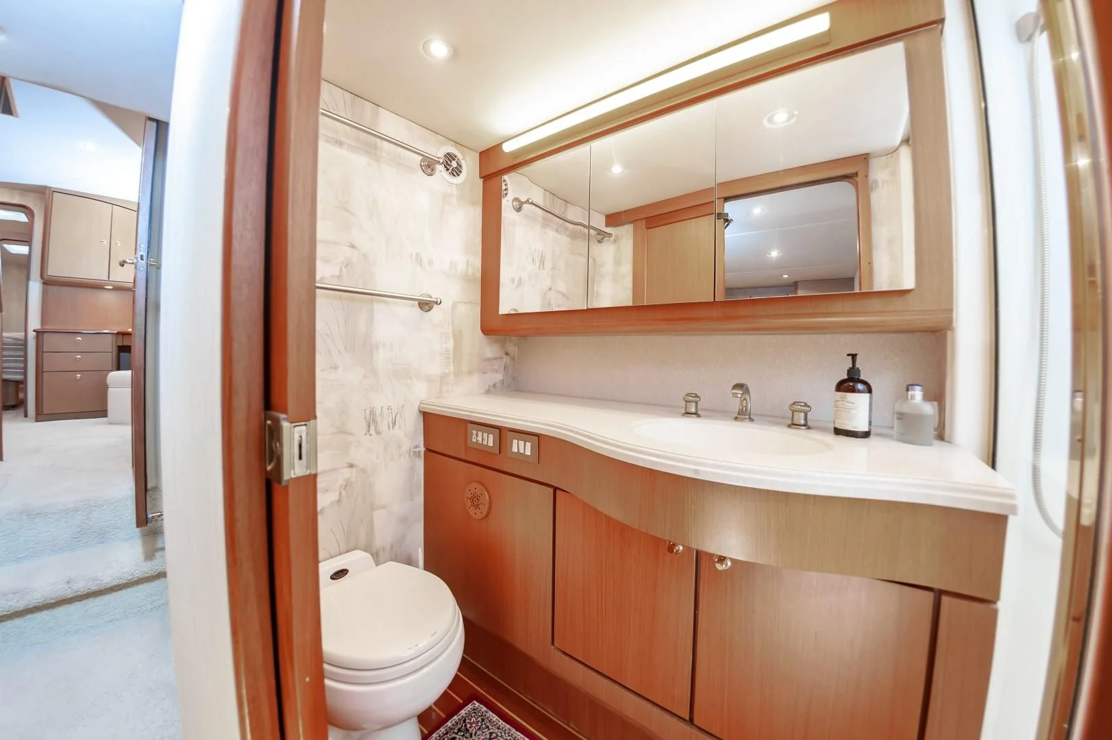 a bathroom with a sink and a toilet aboard DOG HOUSE Yacht for Sale