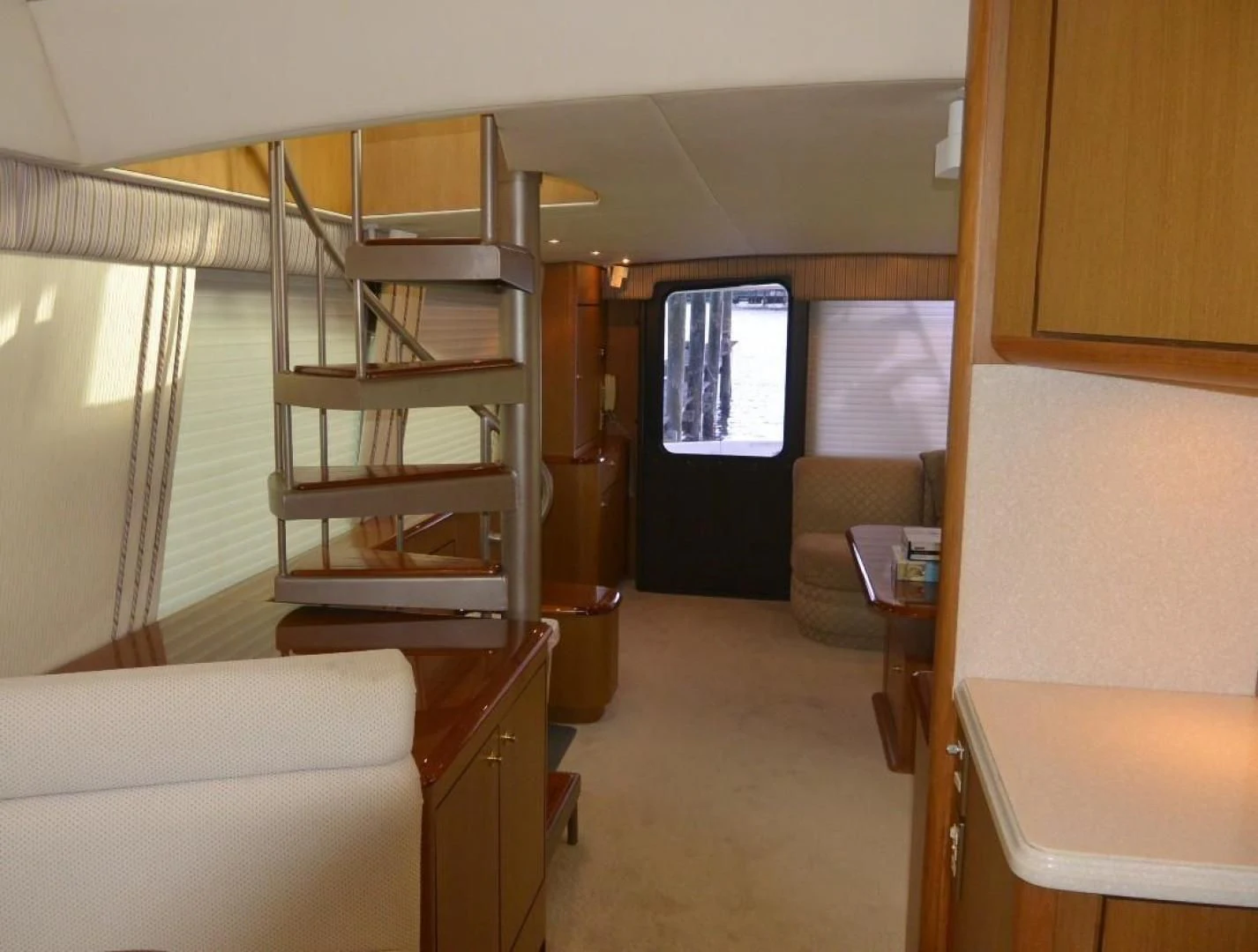 a room with a bunk bed and desk aboard DOG HOUSE Yacht for Sale