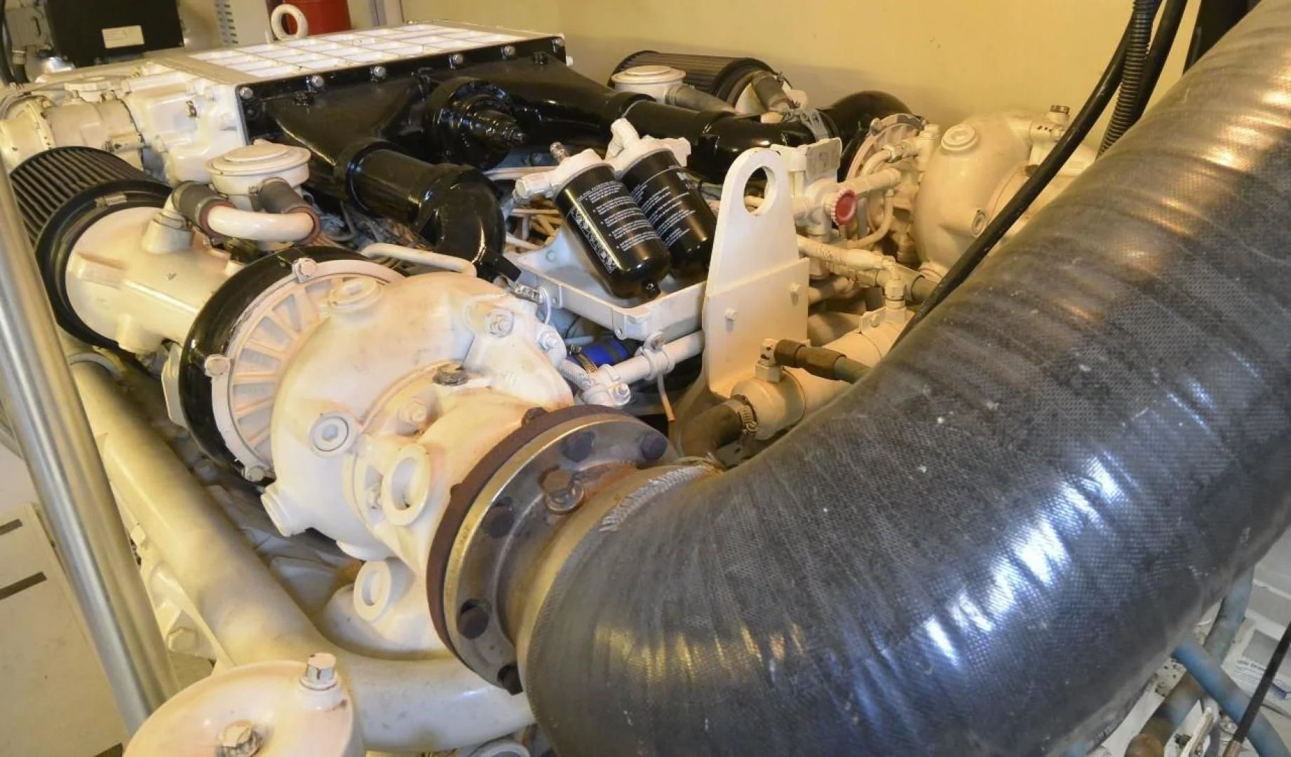 a car engine with a car hood aboard DOG HOUSE Yacht for Sale
