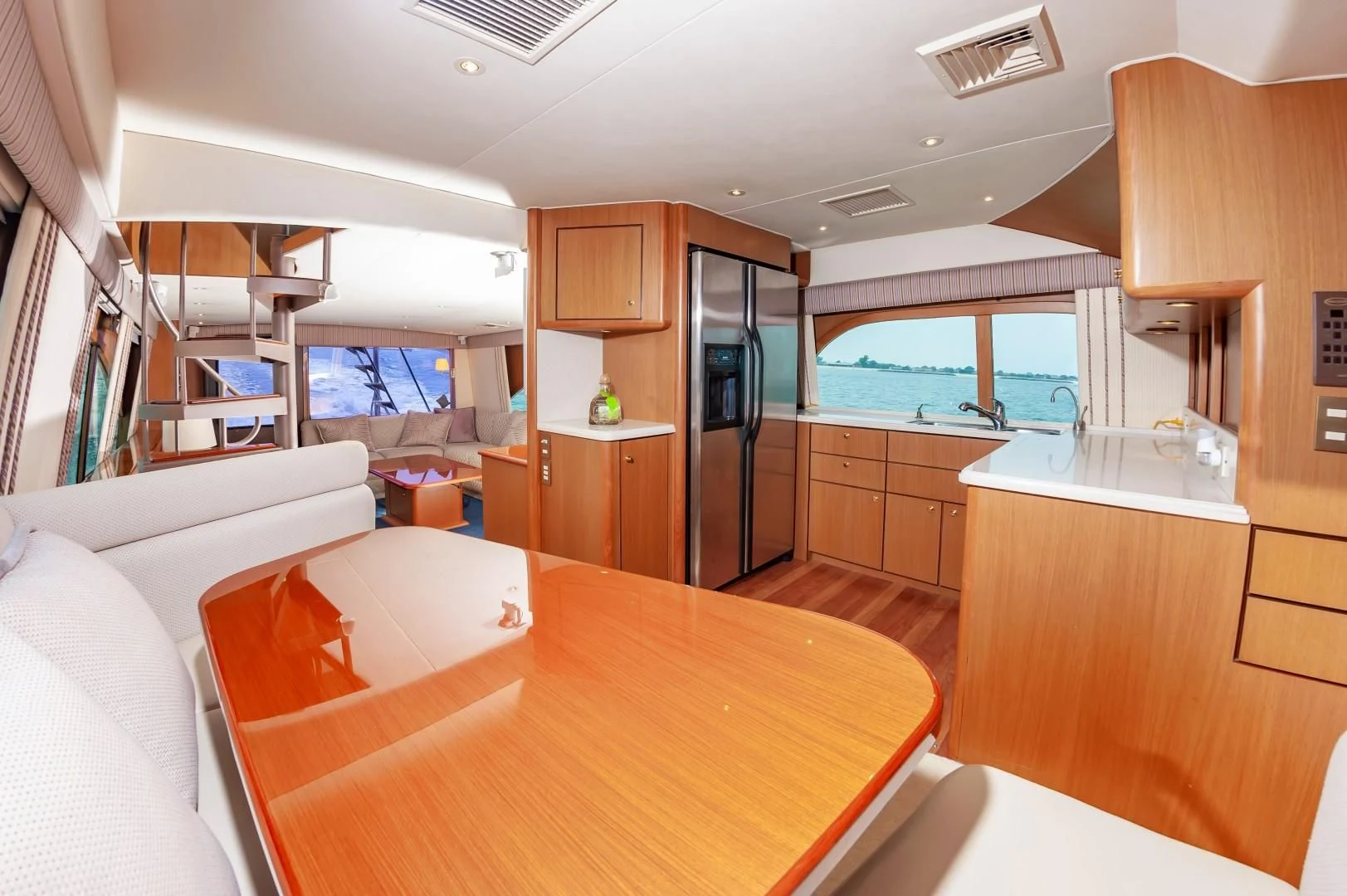 a room with a table and chairs aboard DOG HOUSE Yacht for Sale