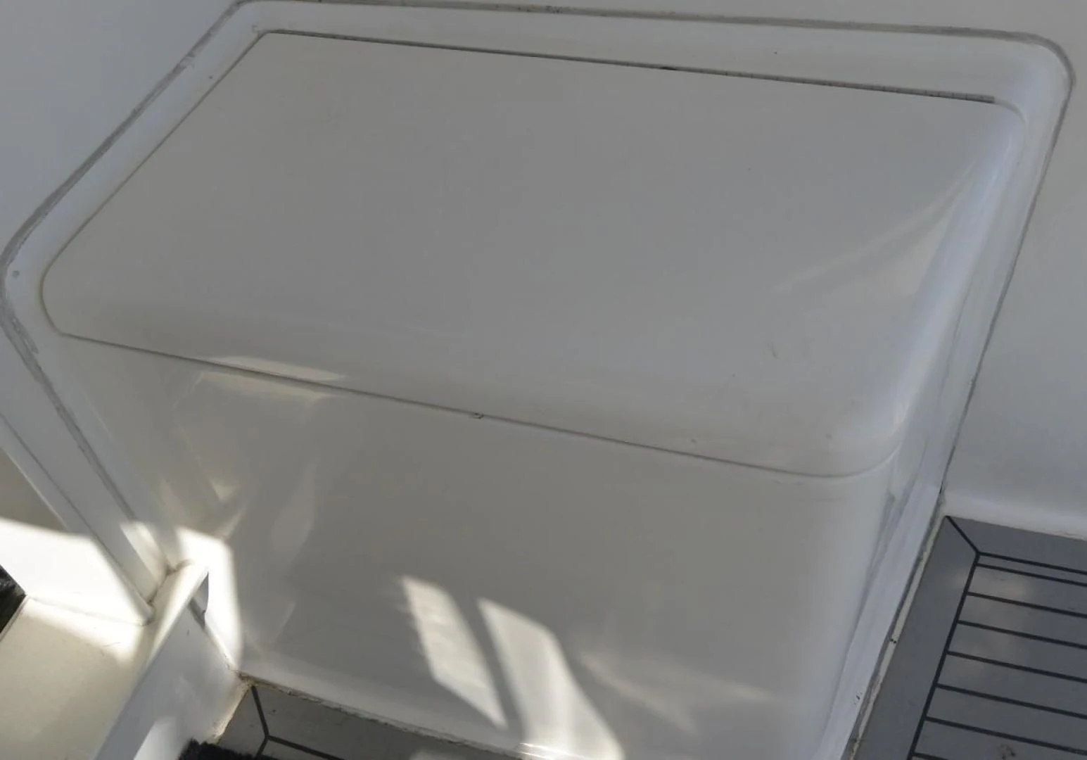 a white object with a hole in it aboard DOG HOUSE Yacht for Sale