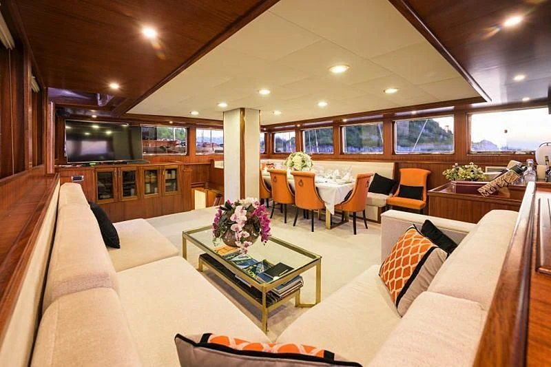 a living room with a large window aboard KAPTAN KADIR Yacht for Sale