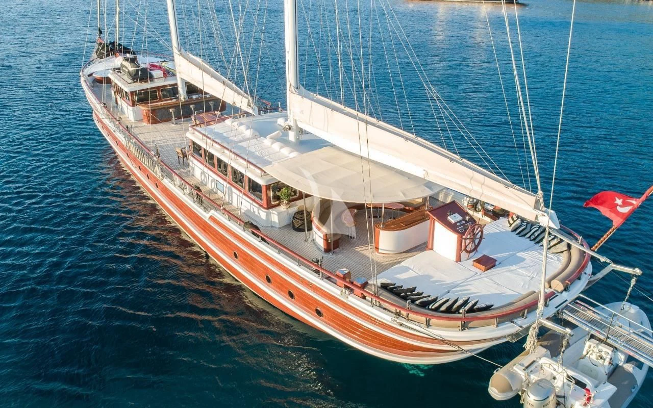 a large white boat in the water aboard KAPTAN KADIR Yacht for Sale