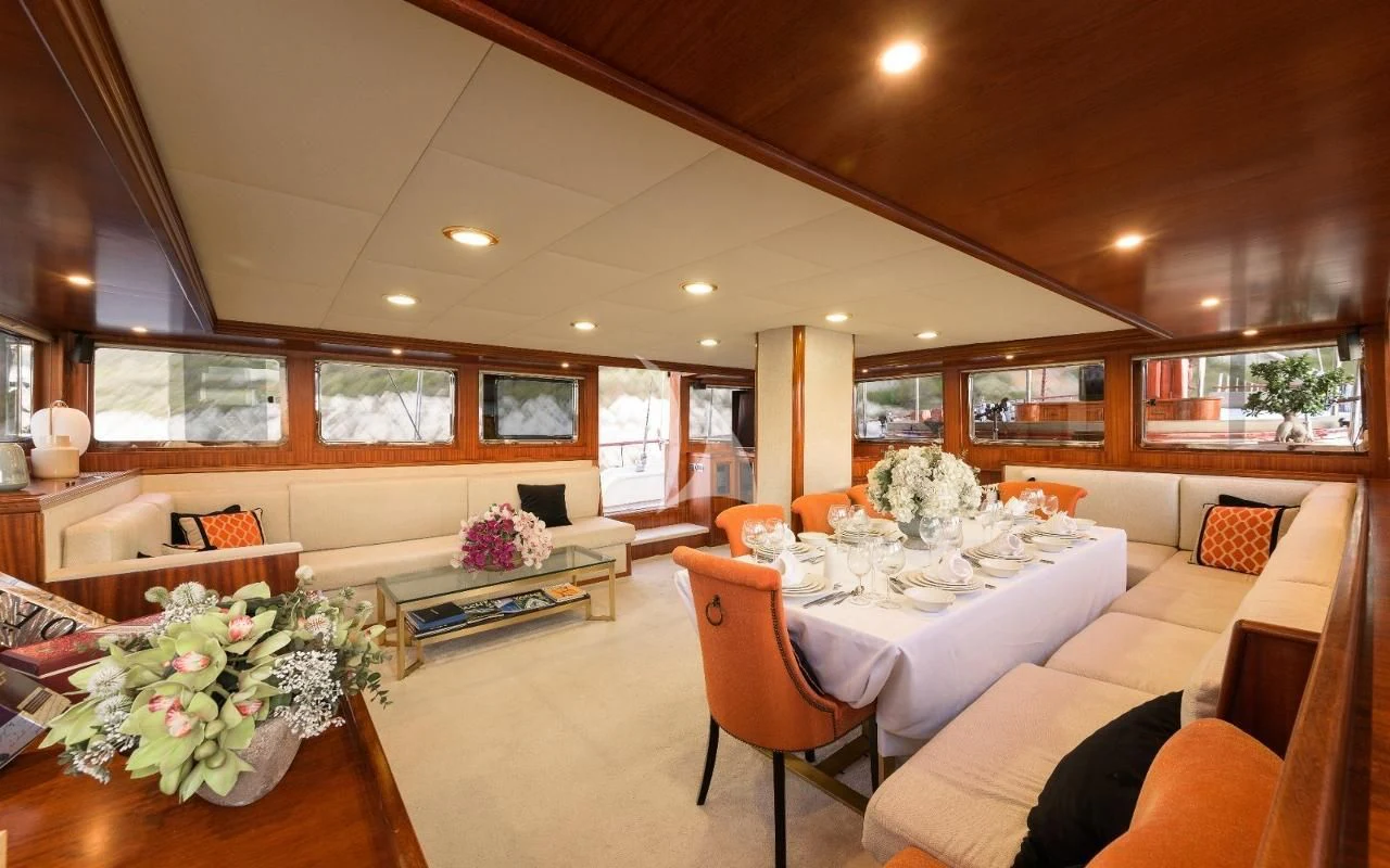 a large living room with a large window aboard KAPTAN KADIR Yacht for Sale