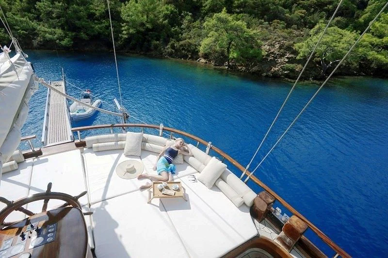 a person sitting on a boat aboard KAPTAN KADIR Yacht for Sale
