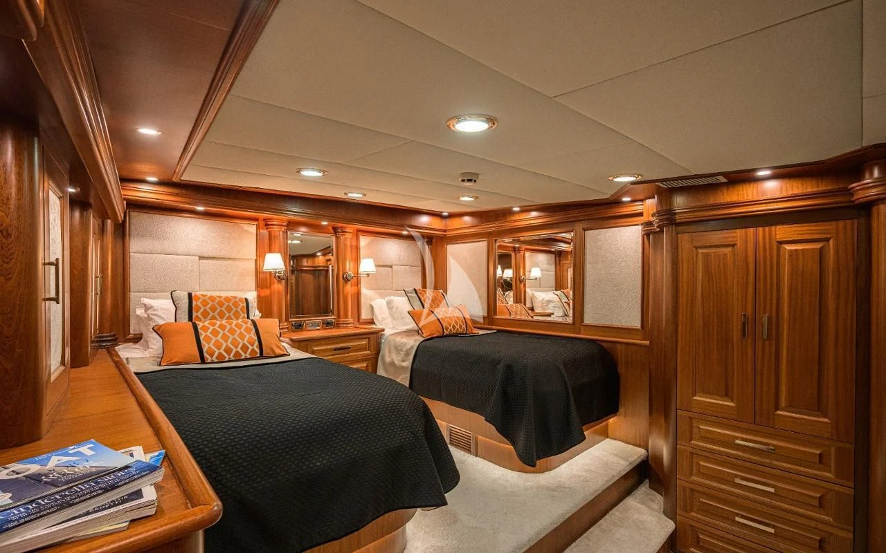 a room with a bed and a desk aboard KAPTAN KADIR Yacht for Sale