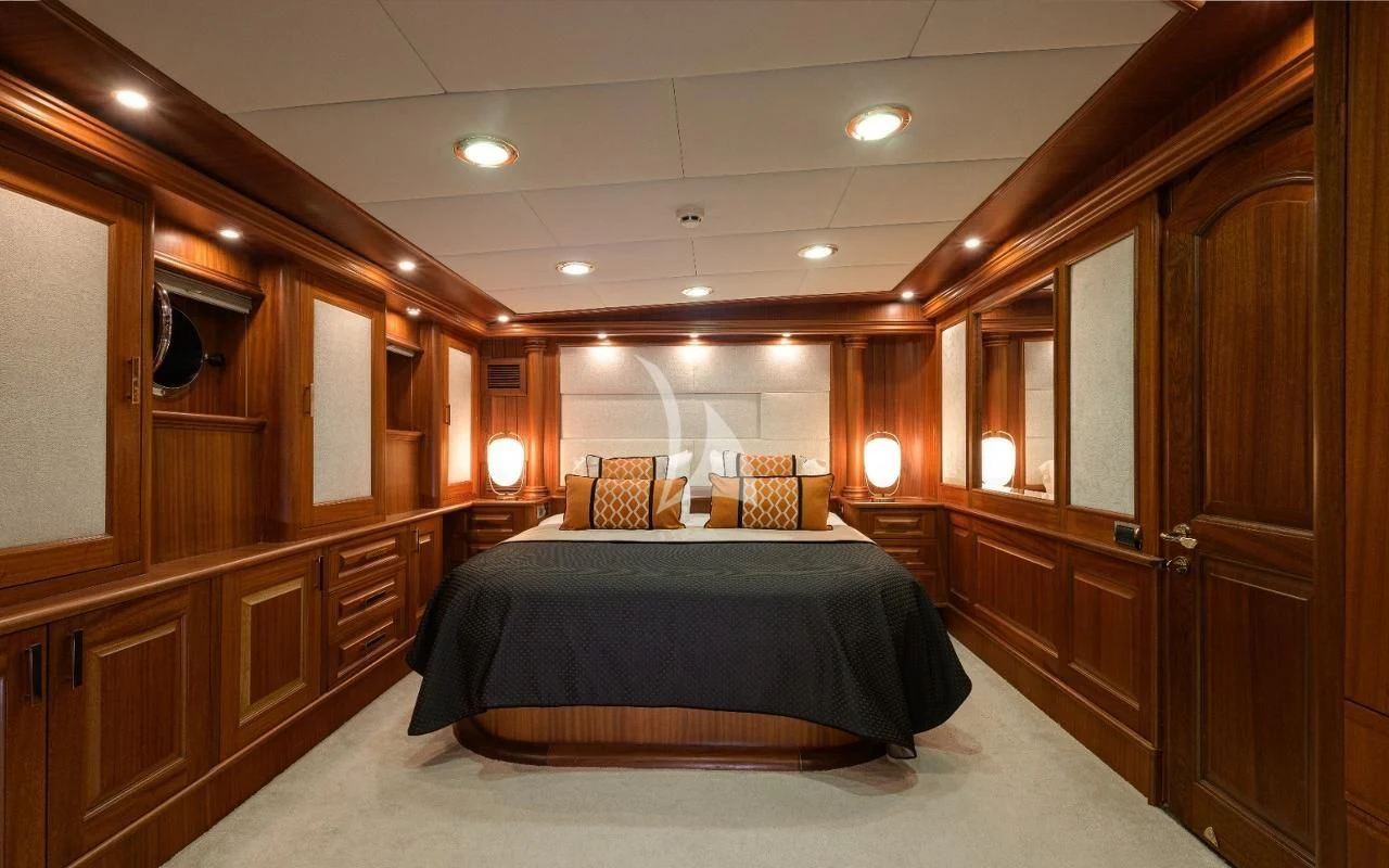a bedroom with a bed aboard KAPTAN KADIR Yacht for Sale