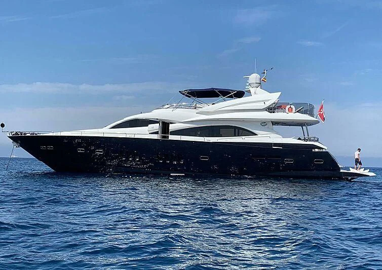 a white yacht in the water aboard INFINITY I Yacht for Sale