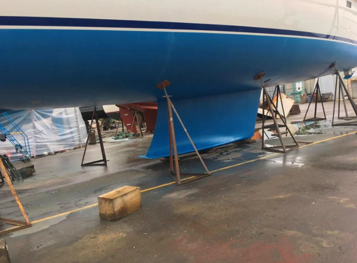 a large blue and white airplane aboard LEONORE Yacht for Sale