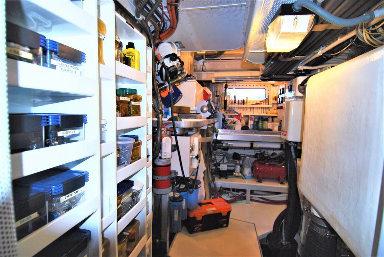 a room with shelves and objects aboard LEONORE Yacht for Sale