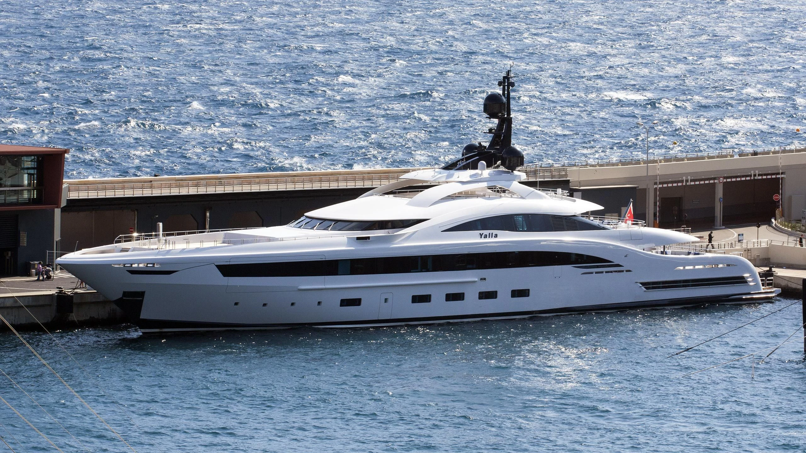a white yacht in the water aboard YALLA Yacht for Sale