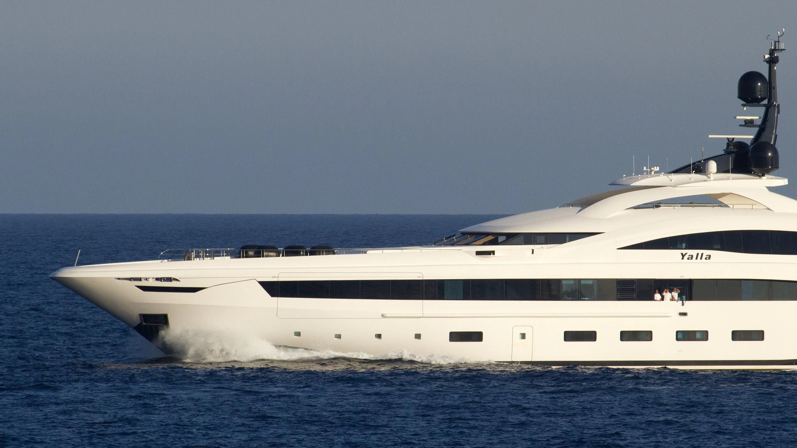 a white yacht in the water aboard YALLA Yacht for Sale