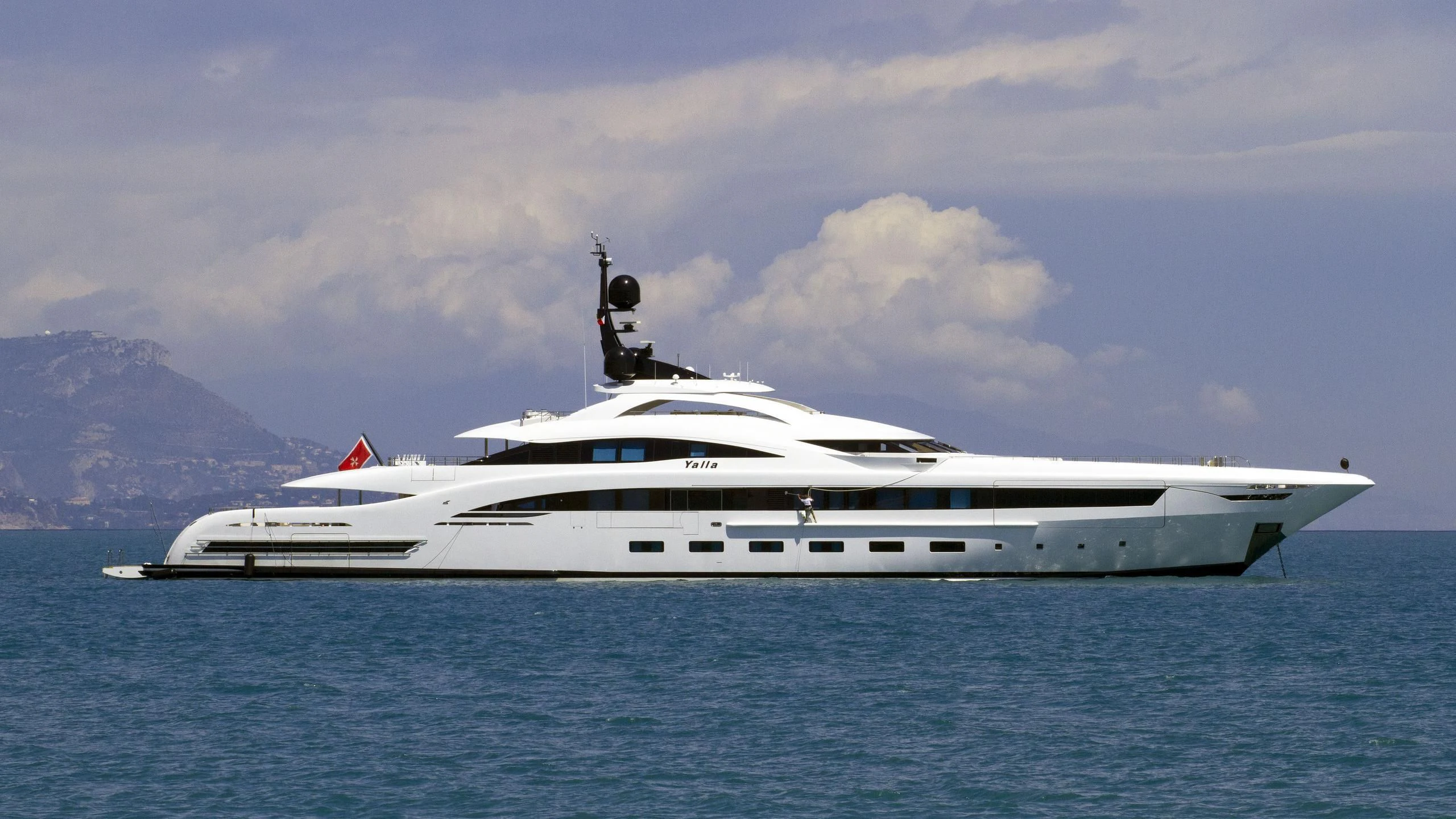 a white yacht in the water aboard YALLA Yacht for Sale