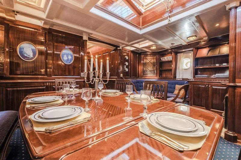 a large dining room with tables and chairs aboard DORIANA Yacht for Sale