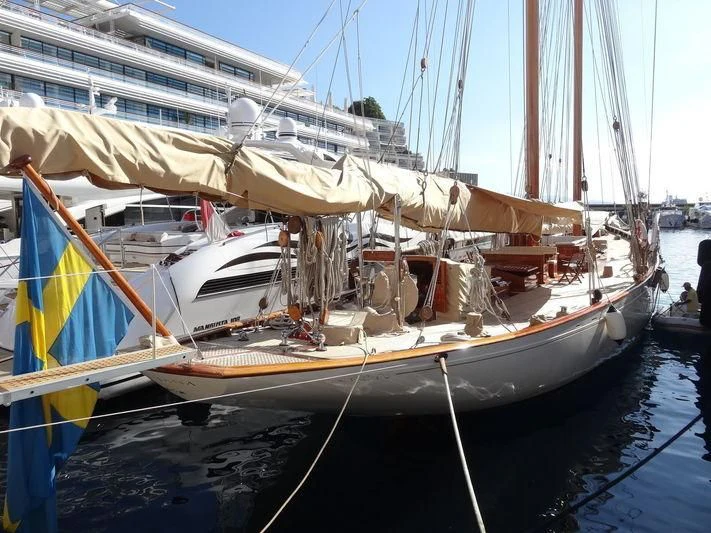 a sailboat docked in a harbor aboard DORIANA Yacht for Sale