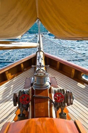 a boat with a yellow umbrella aboard DORIANA Yacht for Sale