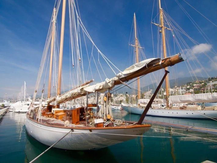 a sailboat docked at a pier aboard DORIANA Yacht for Sale