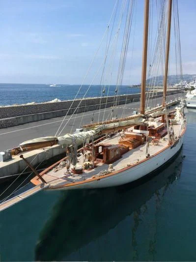 a boat docked at a pier aboard DORIANA Yacht for Sale