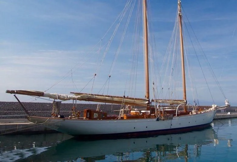 a boat docked at a pier aboard DORIANA Yacht for Sale