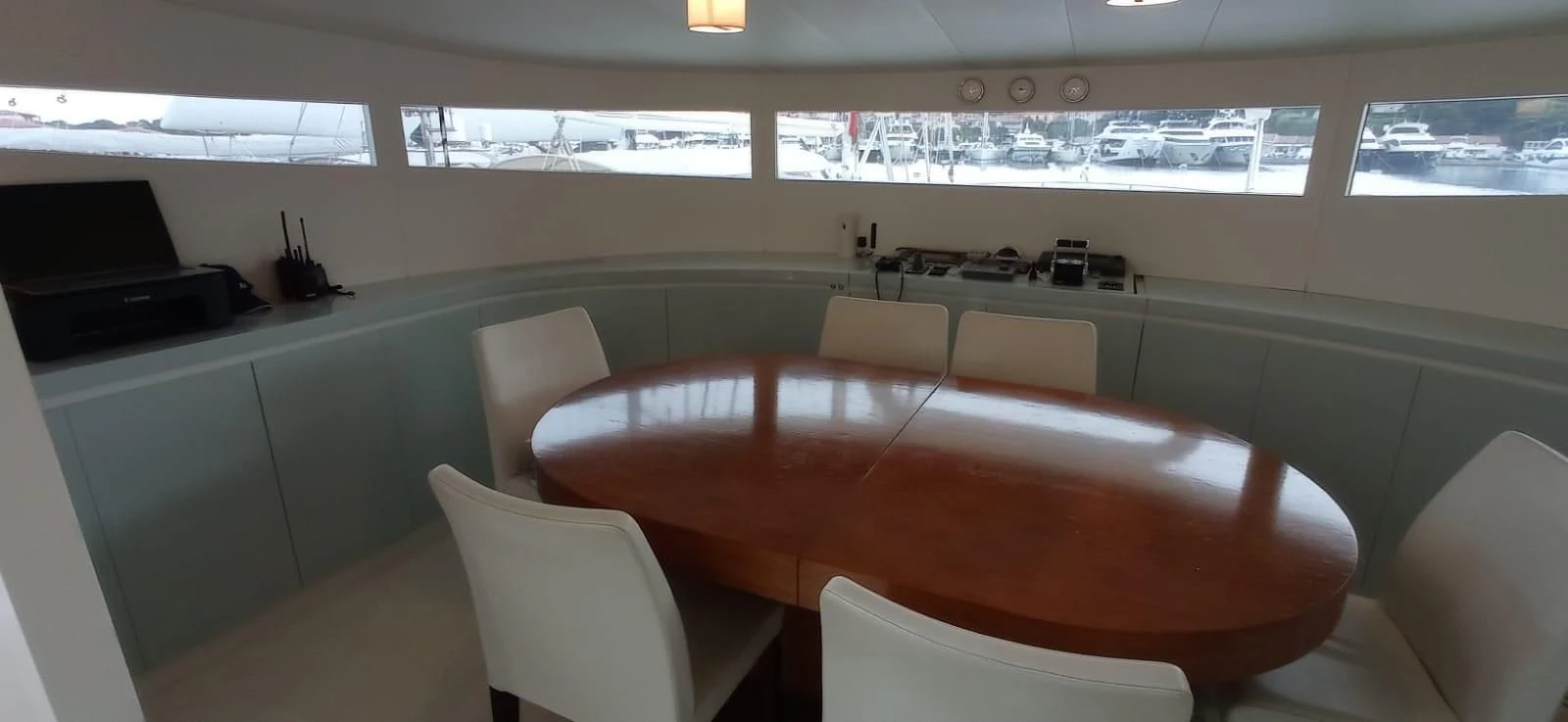 a conference room with chairs and a table aboard MATHISSE Yacht for Sale