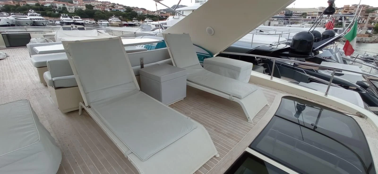a group of white chairs in a room with a white table and chairs aboard MATHISSE Yacht for Sale