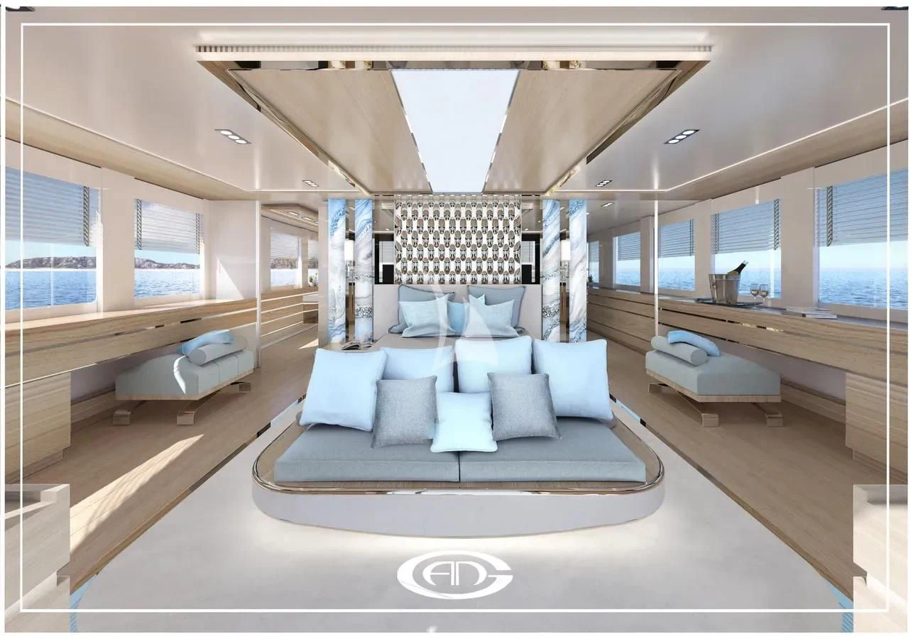 a room with a bed and a couch aboard RENATA Yacht for Sale