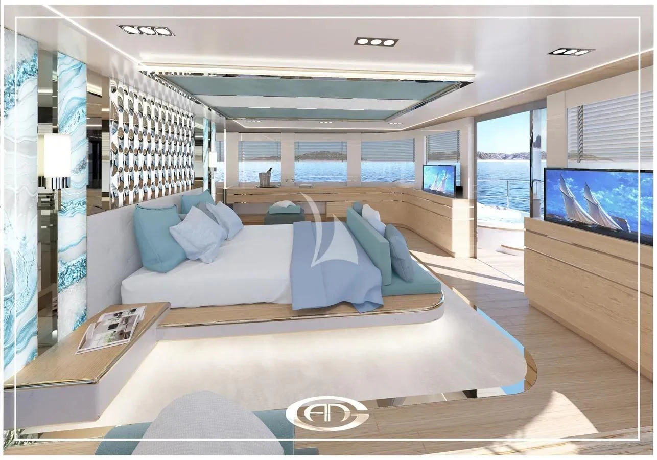 a large room with a bed and a tv aboard RENATA Yacht for Sale