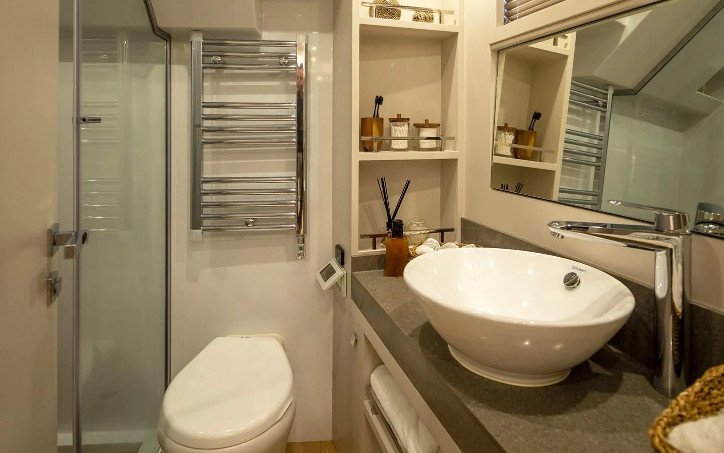 a bathroom with a sink and a shower unit aboard BERING 70 RA Yacht for Sale