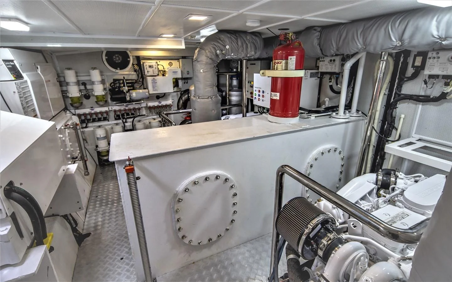 a large industrial machine aboard BERING 70 RA Yacht for Sale