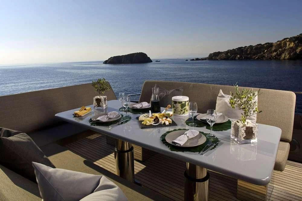 a table with food on it aboard SOLARIS Yacht for Sale