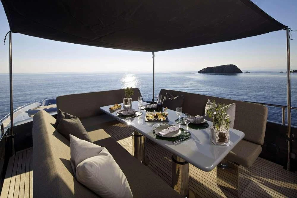 a table with food on it aboard SOLARIS Yacht for Sale