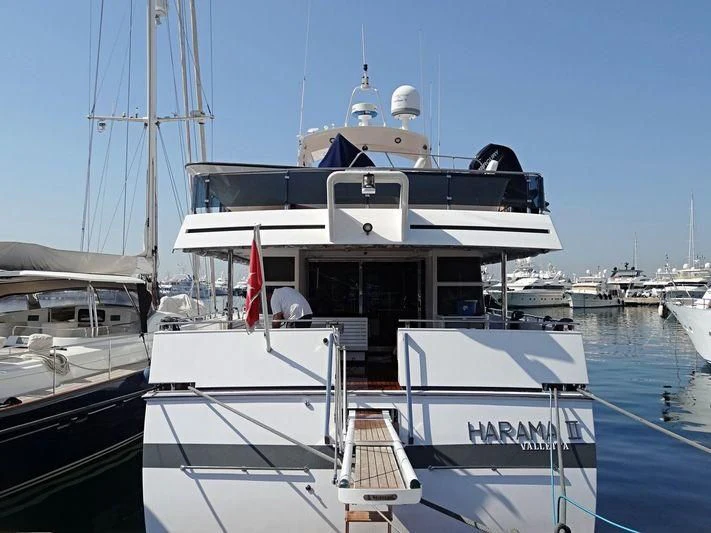 a boat docked at a pier aboard HARAMA II Yacht for Sale