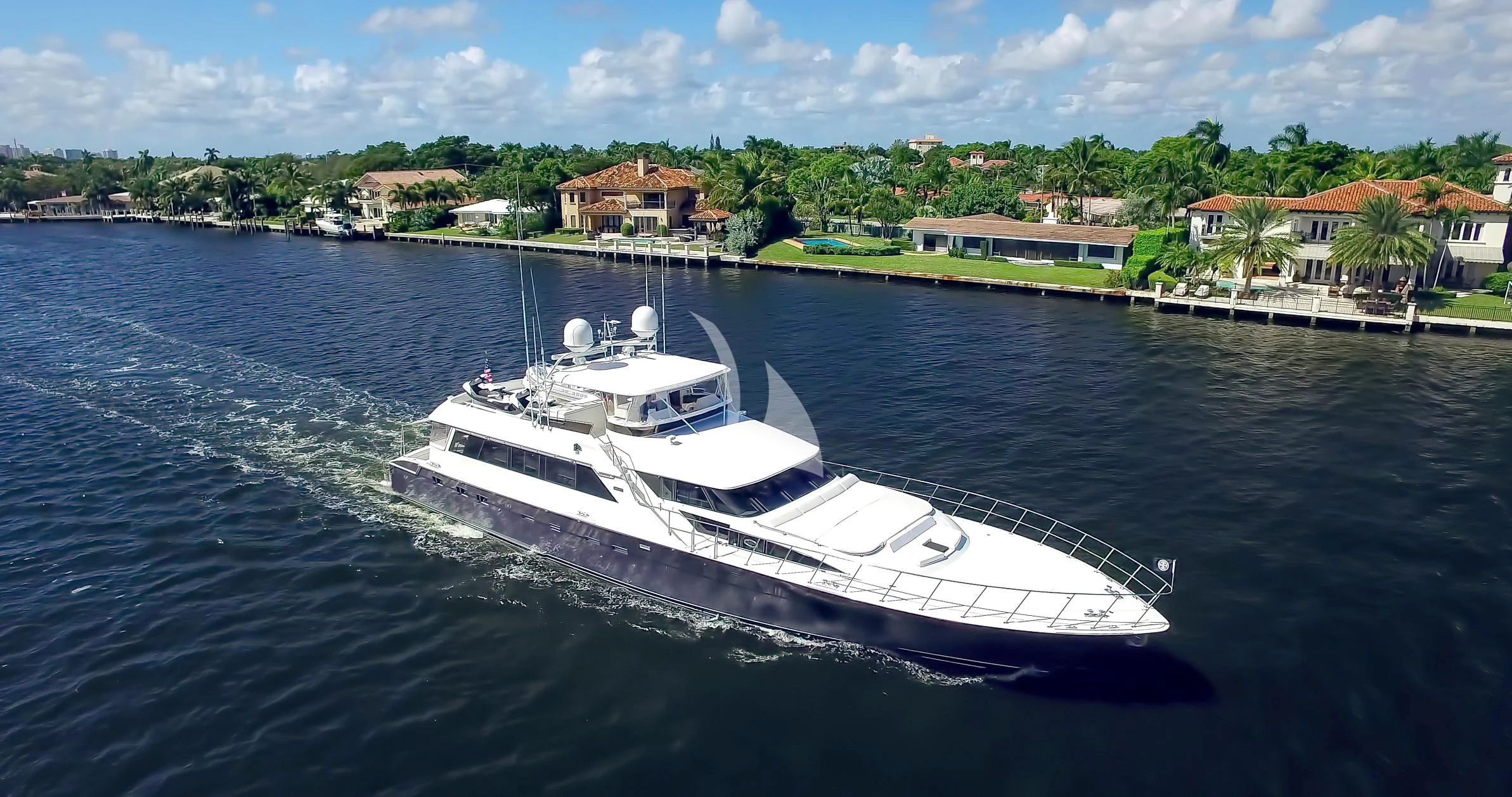 a white boat on the water aboard FIRST HOME Yacht for Sale