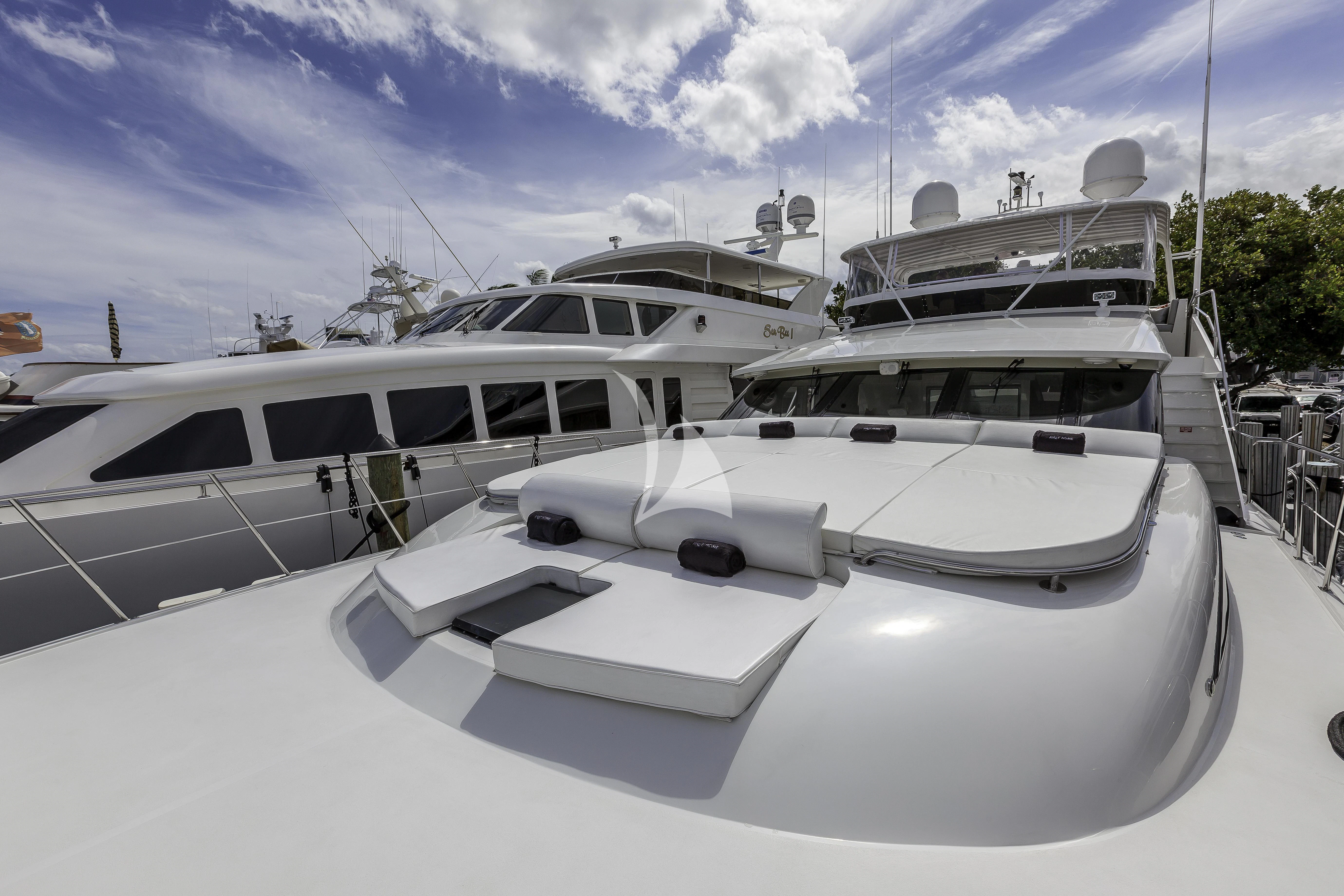 a group of boats are parked in a harbor aboard FIRST HOME Yacht for Sale
