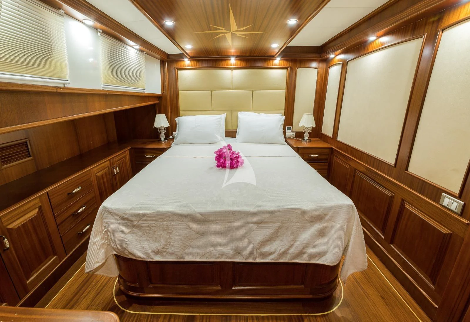 a bed in a room aboard HALCON DEL MAR Yacht for Sale